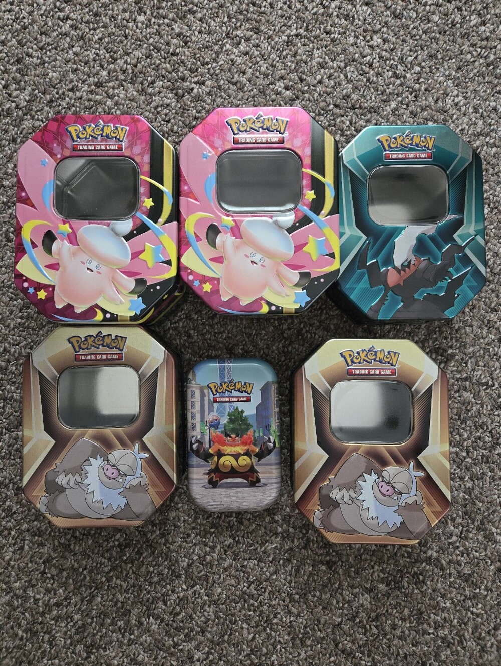 Pokemon EX empty tins.